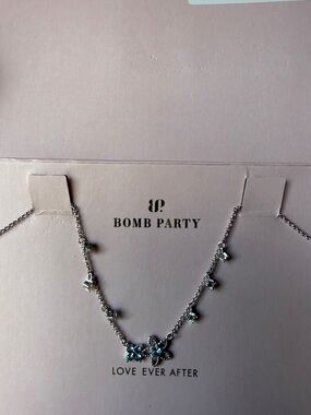 Bomb Party Silver Necklace with Blue Flower Accents